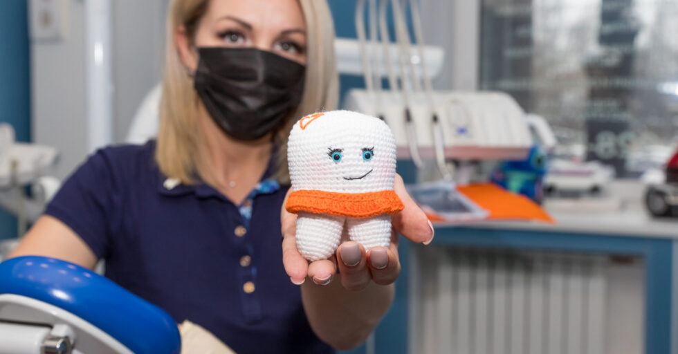 Teeth smile emotion with dental plaque tool ,Concept Dental care cleaning bacterial plaque